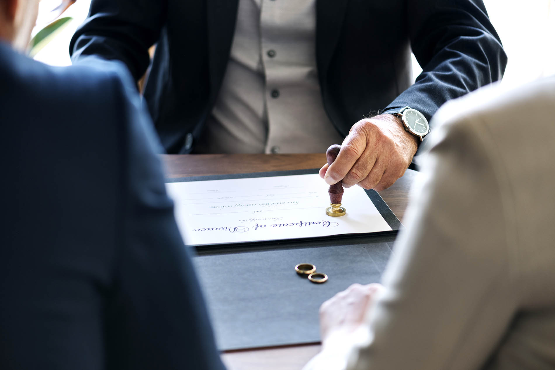 Solicitor stamping a certificate of divorce for a couple